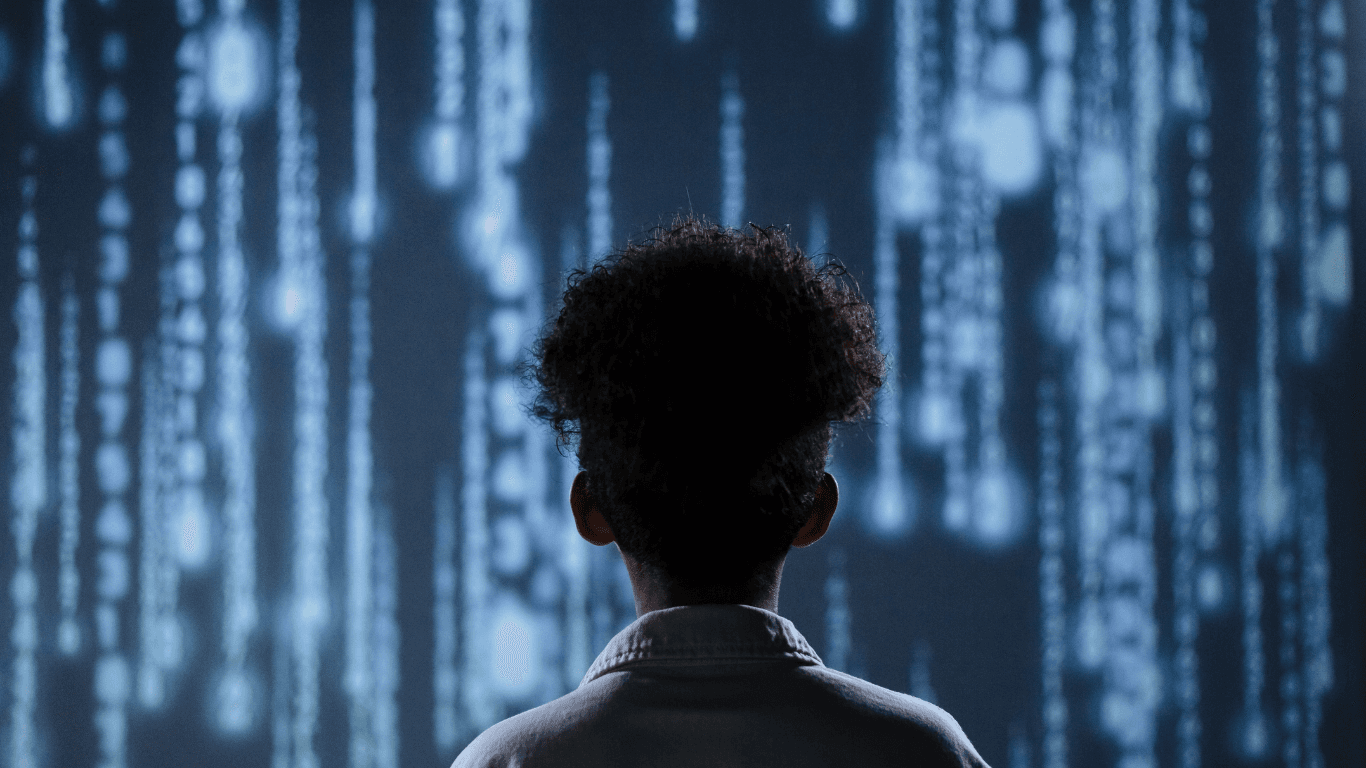 Developer working alongside AI agents, representing the future of collaborative IT teams