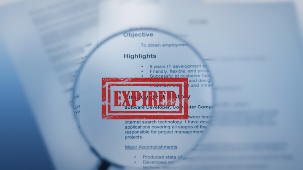 Magnifying glass over a traditional resume with a red Expired stamp overlay, representing credential fraud and the decline of resume-based hiring in the AI era